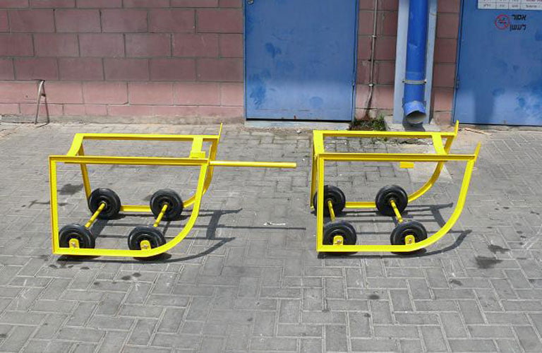 עגלת שינוע והצבת מתקן חביות תמונות מהשטח G
